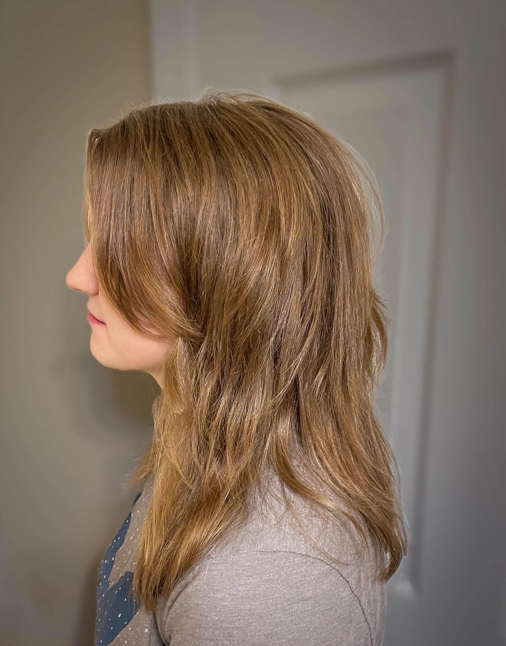 Layered tousled brown hair