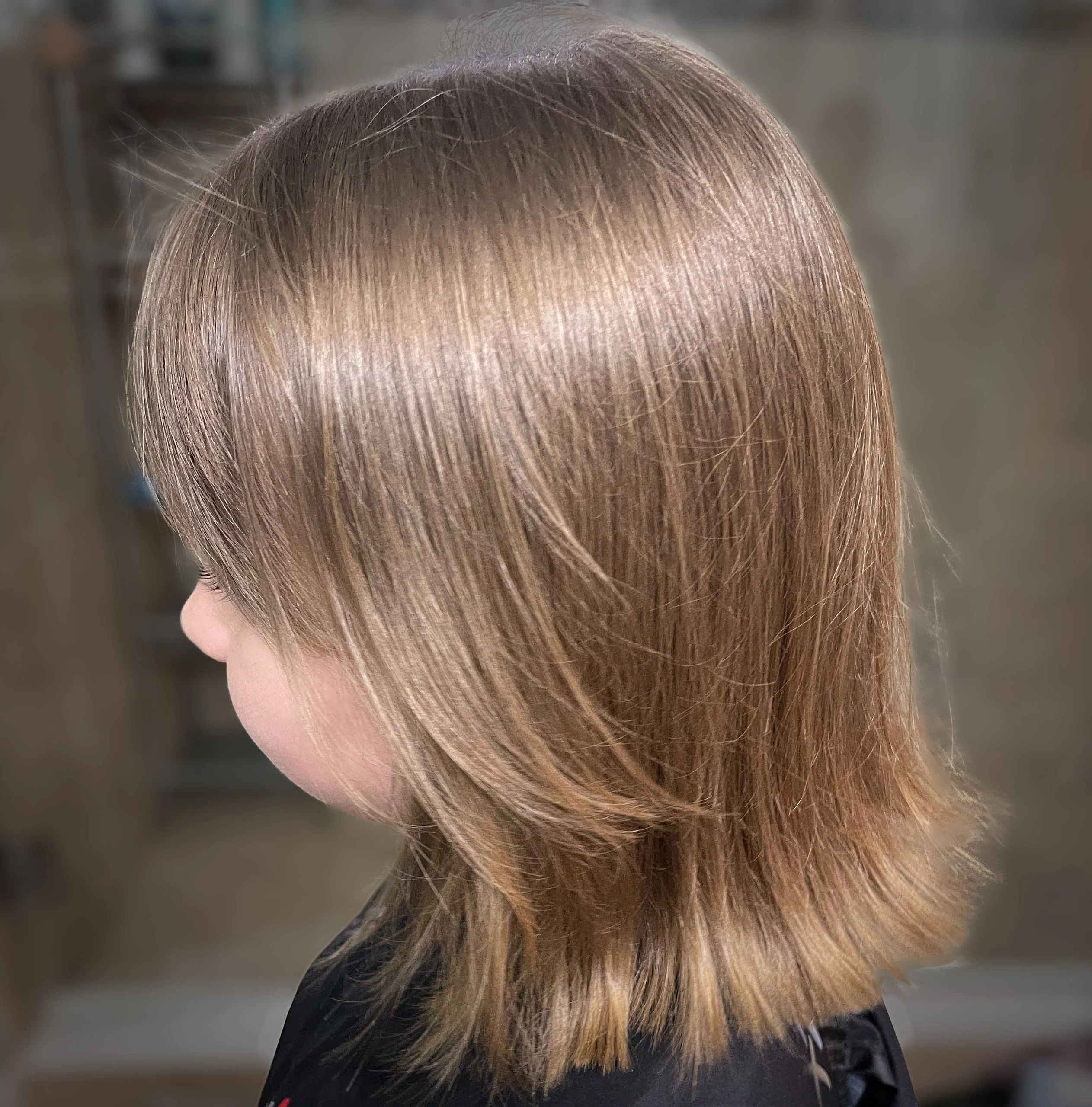 Taupe blonde sleek side profile